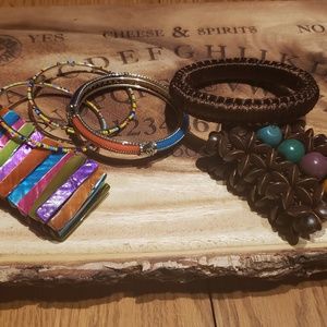 Costume, colorful bracelets.